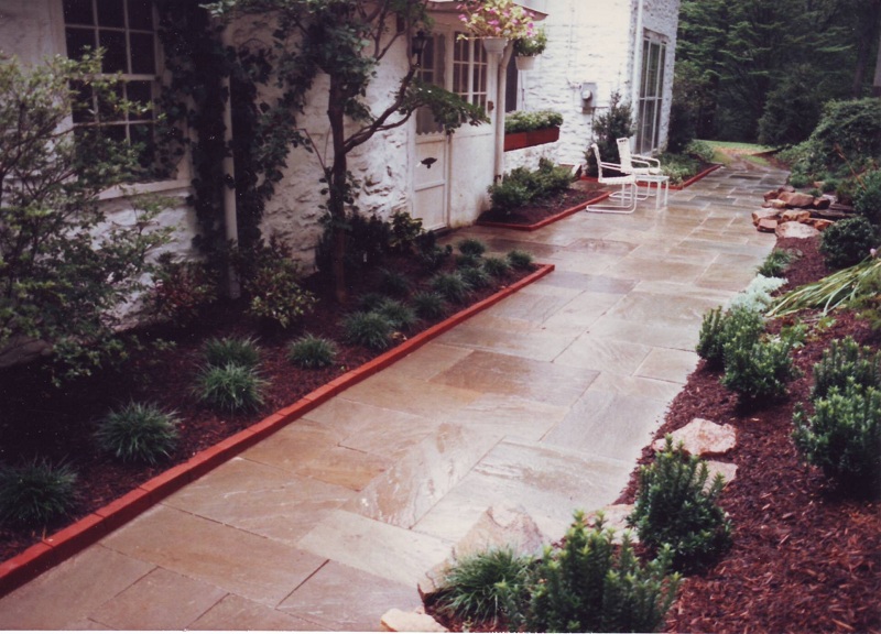 Landscaping Ideas - Flagstone Courtyard and Hillside Planting in Gladwyne - After